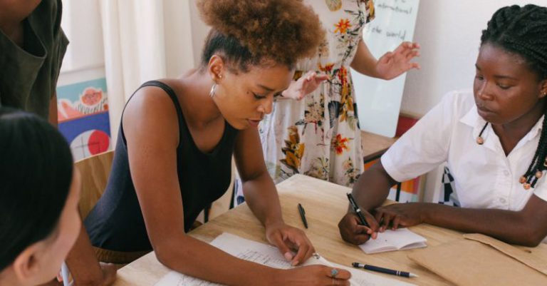 Start-up Success - Photo of Women at the Meeting