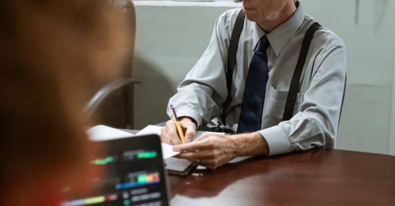 Women In Tech - Man in White Dress Shirt Sitting Beside Woman in White Long Sleeve Shirt