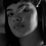 Self Made Billionaires - Woman Wearing Black Spaghetti Strap Top