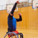 Success Despite Disability - Man on a Wheelchair Playing Basketball