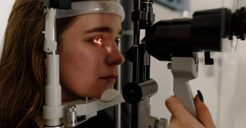 Business Vision - Woman testing vision on microscope