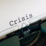 Crisis Management - White Paper On A Vintage Typewriter