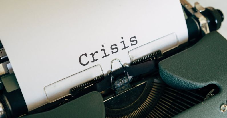 Crisis Management - White Paper On A Vintage Typewriter