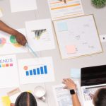 Tech Innovation - Woman Pointing on the White Paper