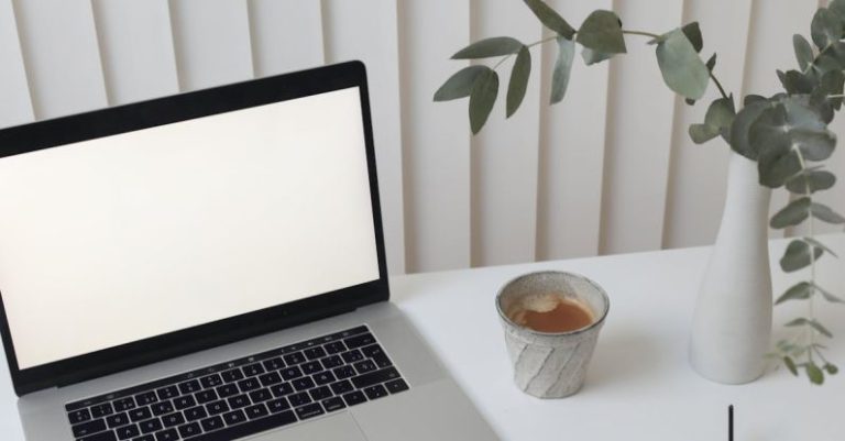 Work Breaks - Creative workplace with laptop and notebook