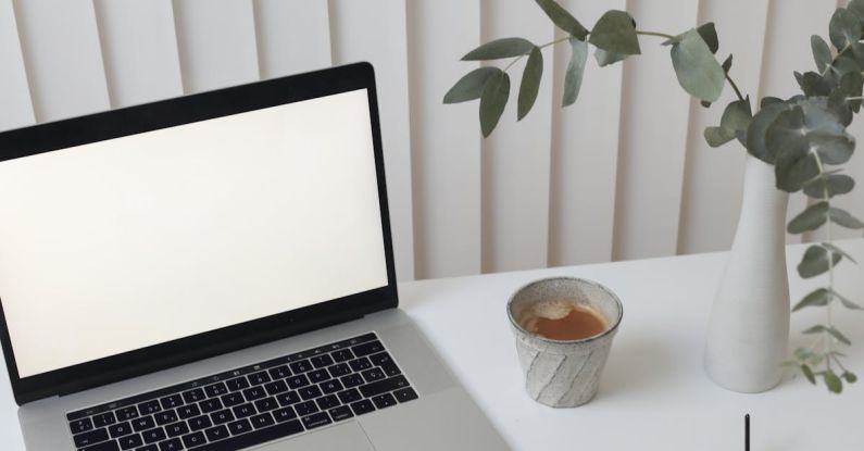 Work Breaks - Creative workplace with laptop and notebook