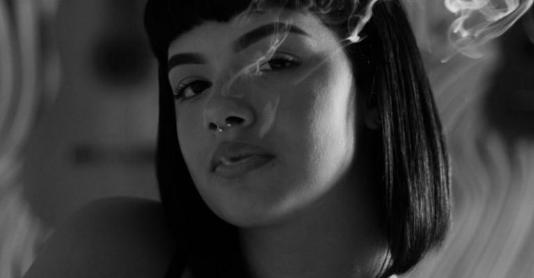 Self Made Billionaires - Woman Wearing Black Spaghetti Strap Top