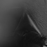 Sleep Optimization - A woman laying on her back with her head in the air