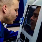 Telemedicine Innovation - Man using a Telemedicine Machine